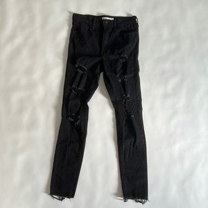 Levi’s high waisted black skinny ripped jeans size 29